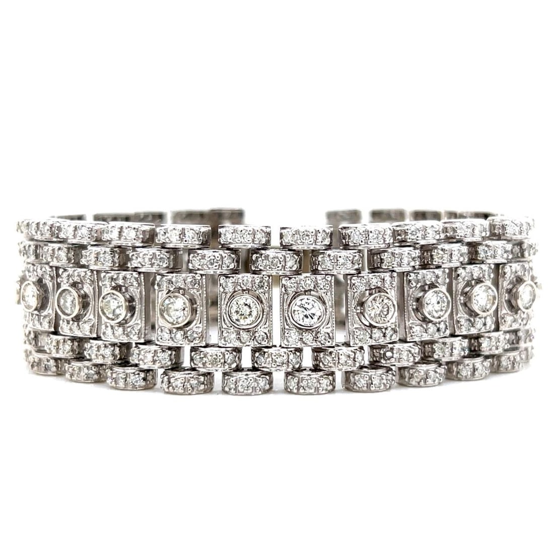 Diamond Bracelet in 14K White Gold with 12.30 Carat Total Weight: Diamond Bracelet in 14K White Gold with 12.30 Carat Total Weight This 14K white gold bracelet features approximately 12.30 carats of diamonds with I-K color and VS1-I1 clarity. The bracelet weighs 69.