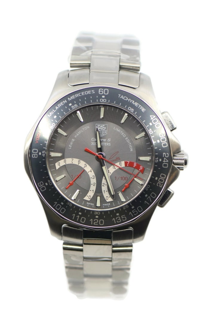 TAG Heuer Aquaracer Regatta Stainless Steel Watch CAF7114 with Papers: TAG Heuer Aquaracer Regatta Stainless Steel Watch CAF7114 with Papers Introducing the TAG Heuer Aquaracer Regatta Stainless Steel Watch, model CAF7114. This sophisticated wristwatch features a durable
