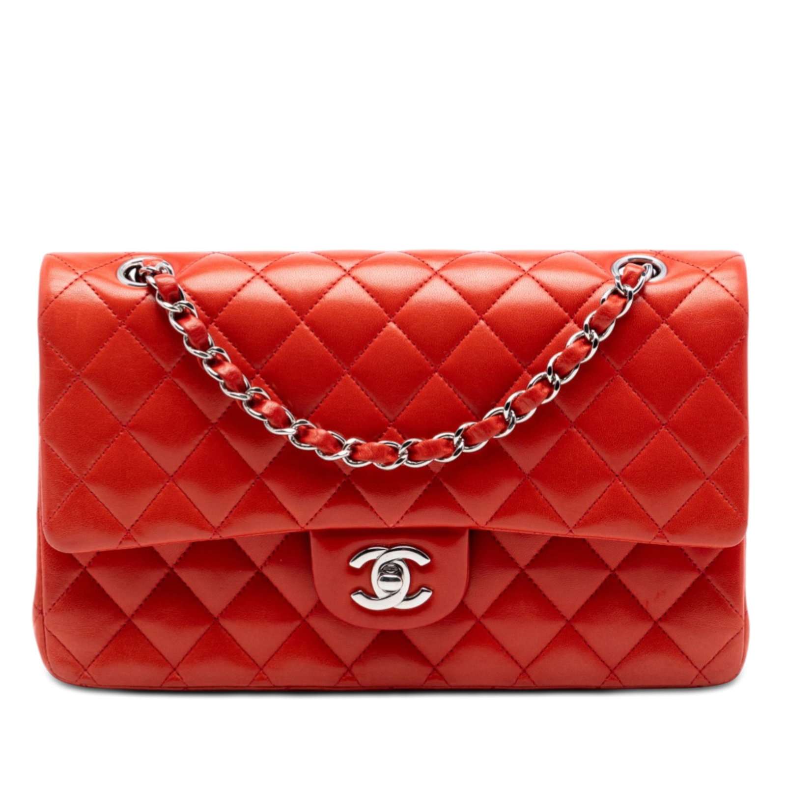 Chanel orange lambskin quilted flap bag Medium Classic: Chanel orange lambskin quilted flap bag Medium Classic This Chanel Medium Classic Double Flap bag is crafted from quilted lambskin leather in orange and features chain shoulder straps, an exterior bac