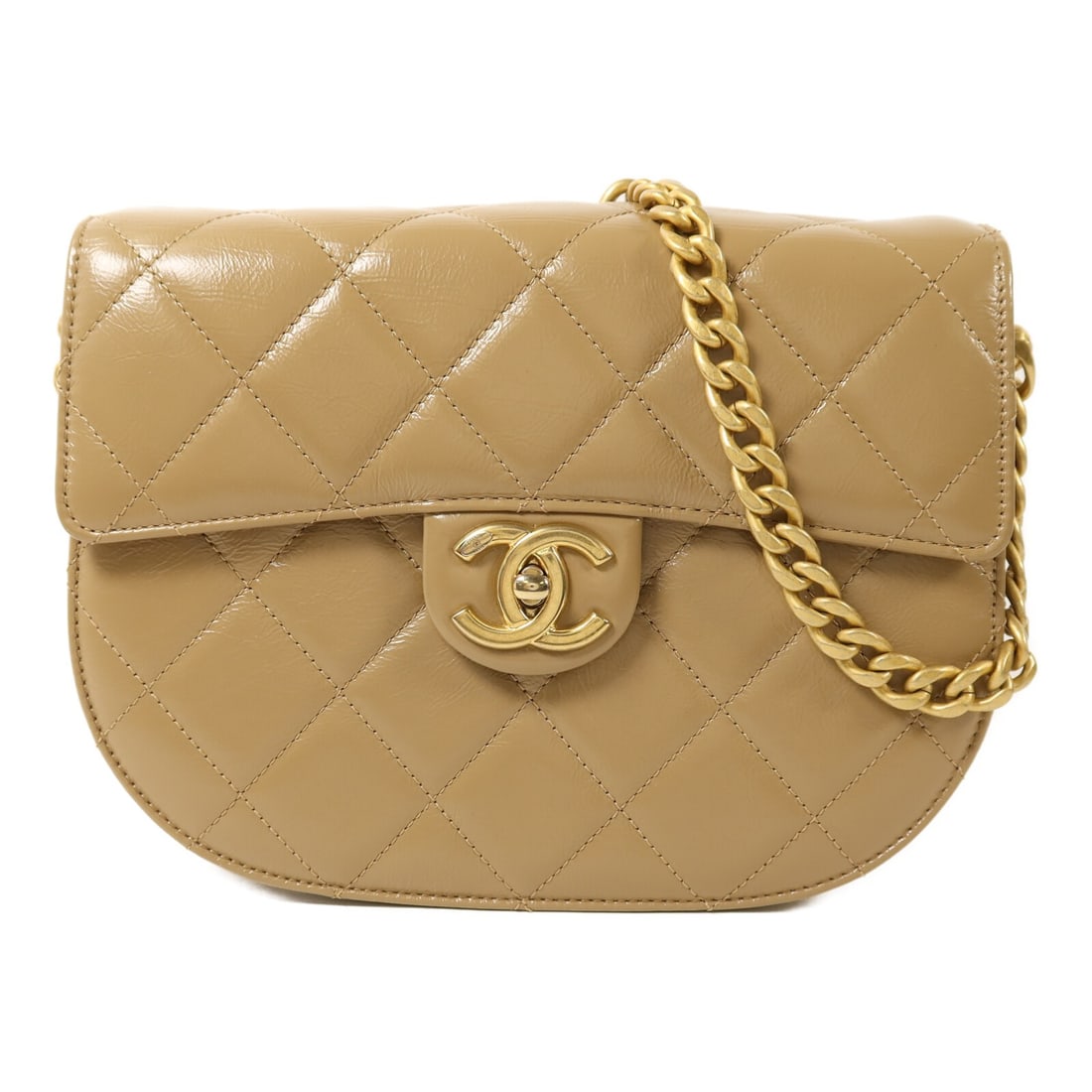 Beige Calfskin CHANEL Half Moon Flap Shoulder Bag with Gold Tone CC Hardware: Beige Calfskin CHANEL Half Moon Flap Shoulder Bag with Gold Tone CC Hardware This CHANEL Half Moon Flap Bag is crafted from beige calfskin leather and features the iconic CC detail. Designed as a shou