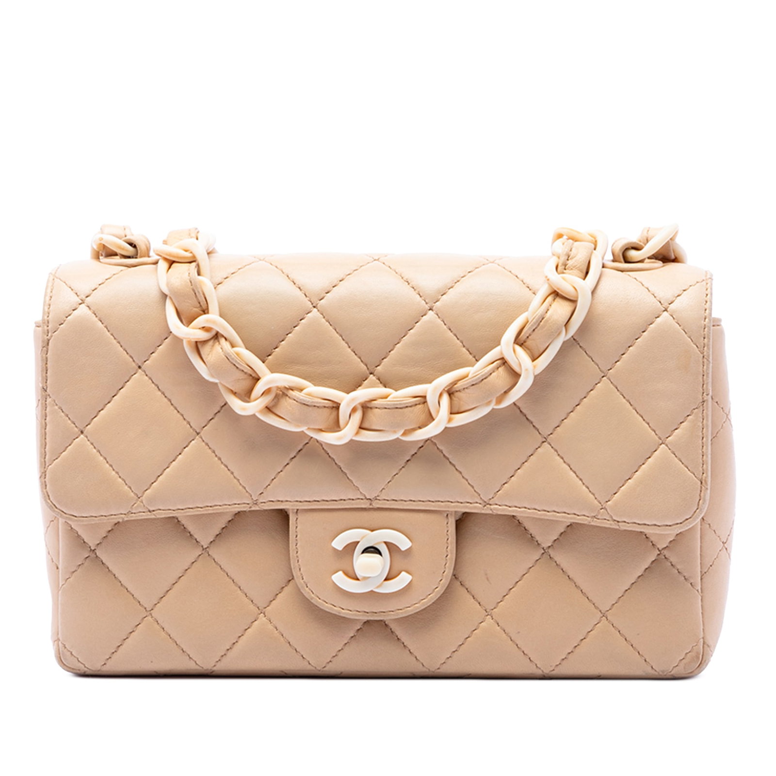Chanel beige quilted lambskin flap bag resin chain: Chanel beige quilted lambskin flap bag resin chain This Chanel CC Quilted Lambskin Resin Chain Single Flap bag features a quilted lambskin leather exterior in beige, complemented by a leather-woven ch