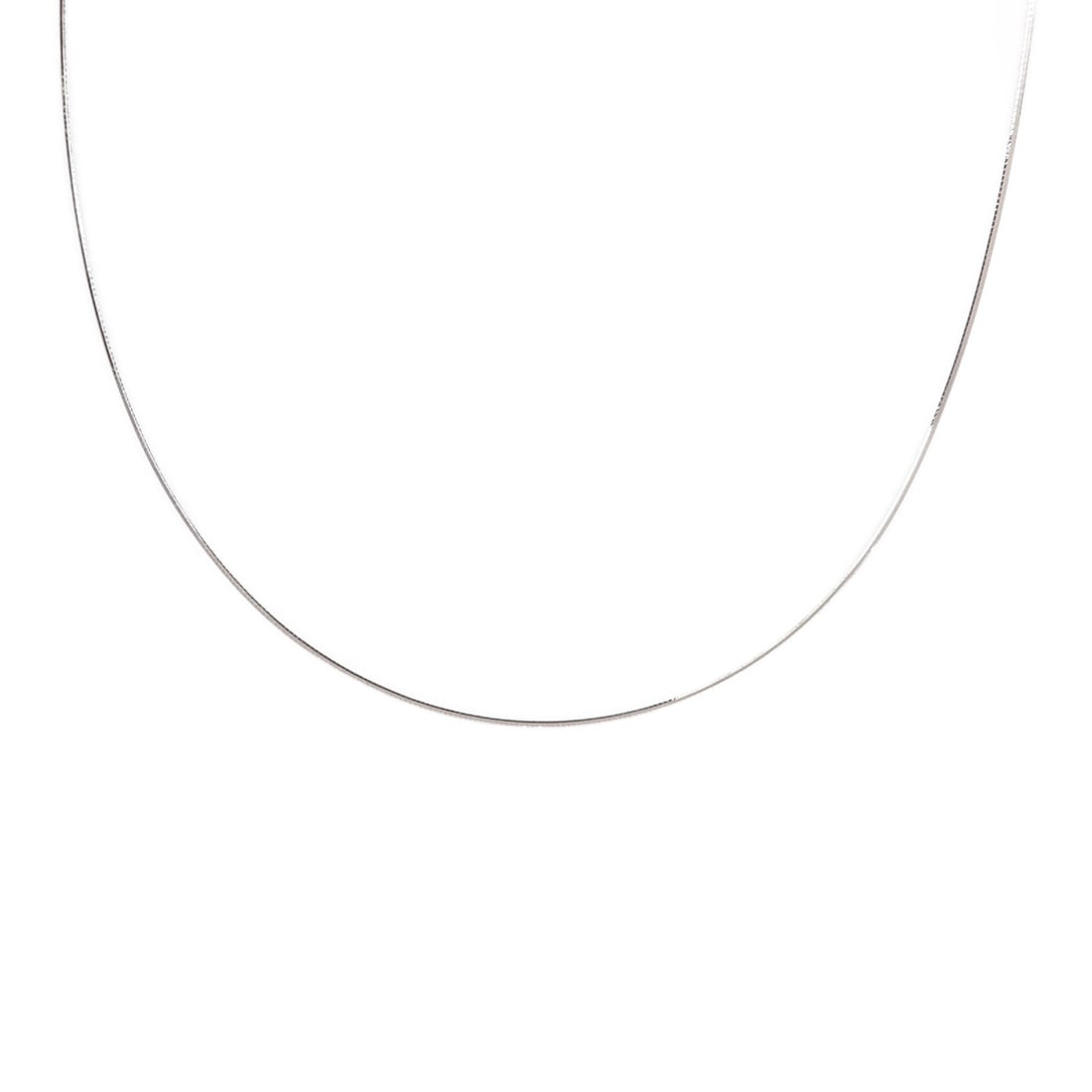 White Gold 18K Necklace JEWELRY: White Gold 18K Necklace JEWELRY This women's necklace is crafted from 18K white gold, offering a sleek and elegant silver tone. The necklace features a minimalist design without any gemstones, making 