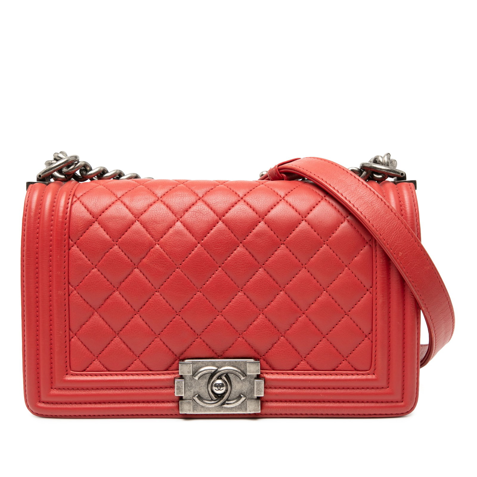 Chanel Boy Flap Old Medium Red Quilted Lambskin Shoulder Bag: Chanel Boy Flap Old Medium Red Quilted Lambskin Shoulder Bag This Chanel Old Medium Quilted Lambskin Boy Flap bag showcases a quilted lambskin leather exterior in red, complemented by a chain link str