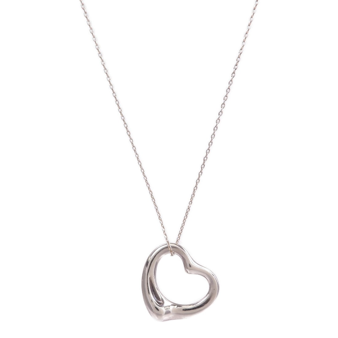 Elsa Peretti Open Heart Pendant Necklace in 925 Silver by Tiffany and Co: Elsa Peretti Open Heart Pendant Necklace in 925 Silver by Tiffany and Co This Tiffany & Co. Elsa Peretti Open Heart necklace is crafted from 925 sterling silver and designed for women. The piece featu