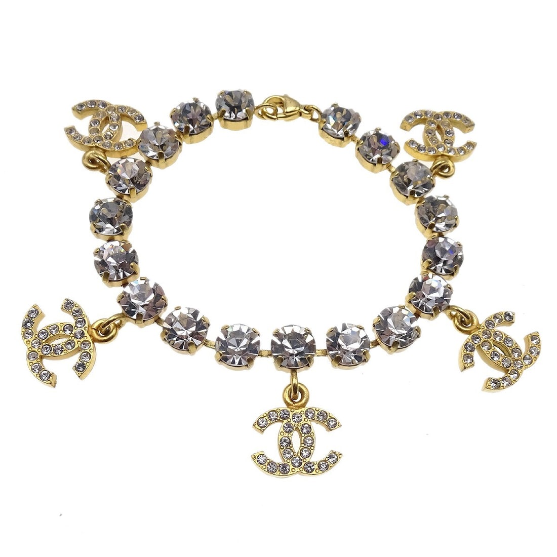 Chanel 95A Gold Rhinestone Chain Bracelet Luxury Accessory: Chanel 95A Gold Rhinestone Chain Bracelet Luxury Accessory Elevate your accessory collection with this exquisite Chanel Rhinestone Gold Chain Bracelet from the 95A collection. Featuring a stunning gol