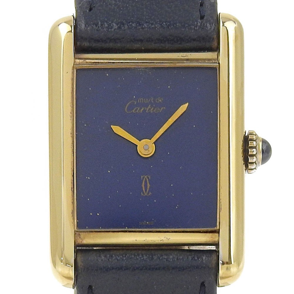 Cartier Must Tank Ladies Vermeil Lapis Blue 925 Manual Wristwatch: Cartier Must Tank Ladies Vermeil Lapis Blue 925 Manual Wristwatch This vintage Cartier Must Tank Vermeil wristwatch is designed for women and features a lapis blue dial. Crafted in Switzerland, it sho