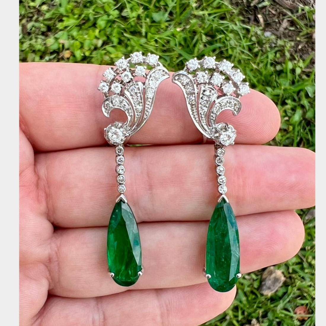 1960s 18K White Gold Emerald 13.87 Ct Diamond Earrings: 1960s 18K White Gold Emerald 13.87 Ct Diamond Earrings Elegant 1960's earrings crafted from 18K white gold, featuring stunning emeralds and sparkling diamonds. These earrings weigh 13.6 grams and are 