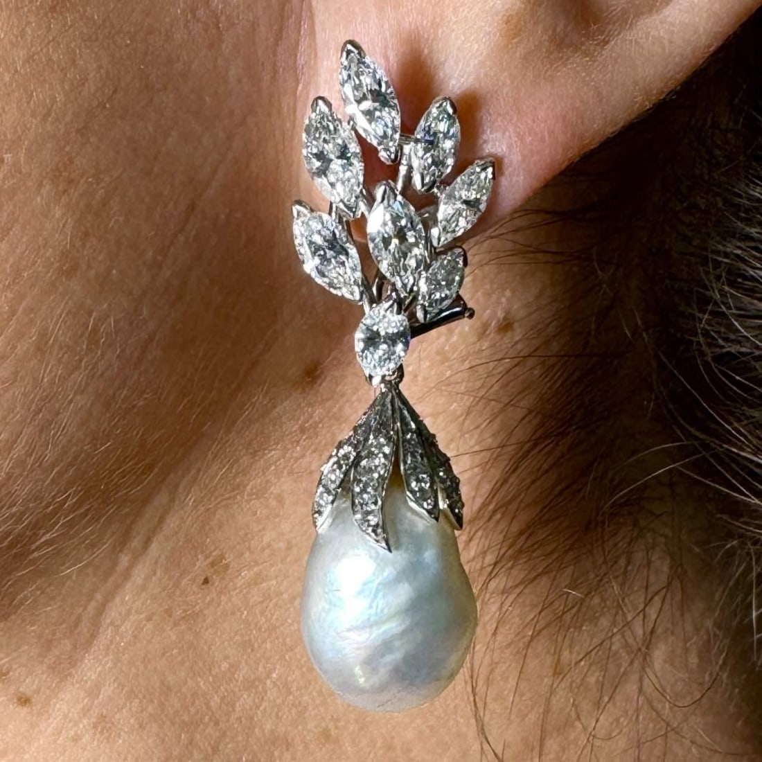 1950's Platinum Earrings with GIA Certified South Sea Pearls and 74 Diamonds: 1950's Platinum Earrings with GIA Certified South Sea Pearls and 74 Diamonds Indulge in the elegance of these 1950's Platinum earrings featuring GIA Certified South Sea Pearls. Each earring is adorned