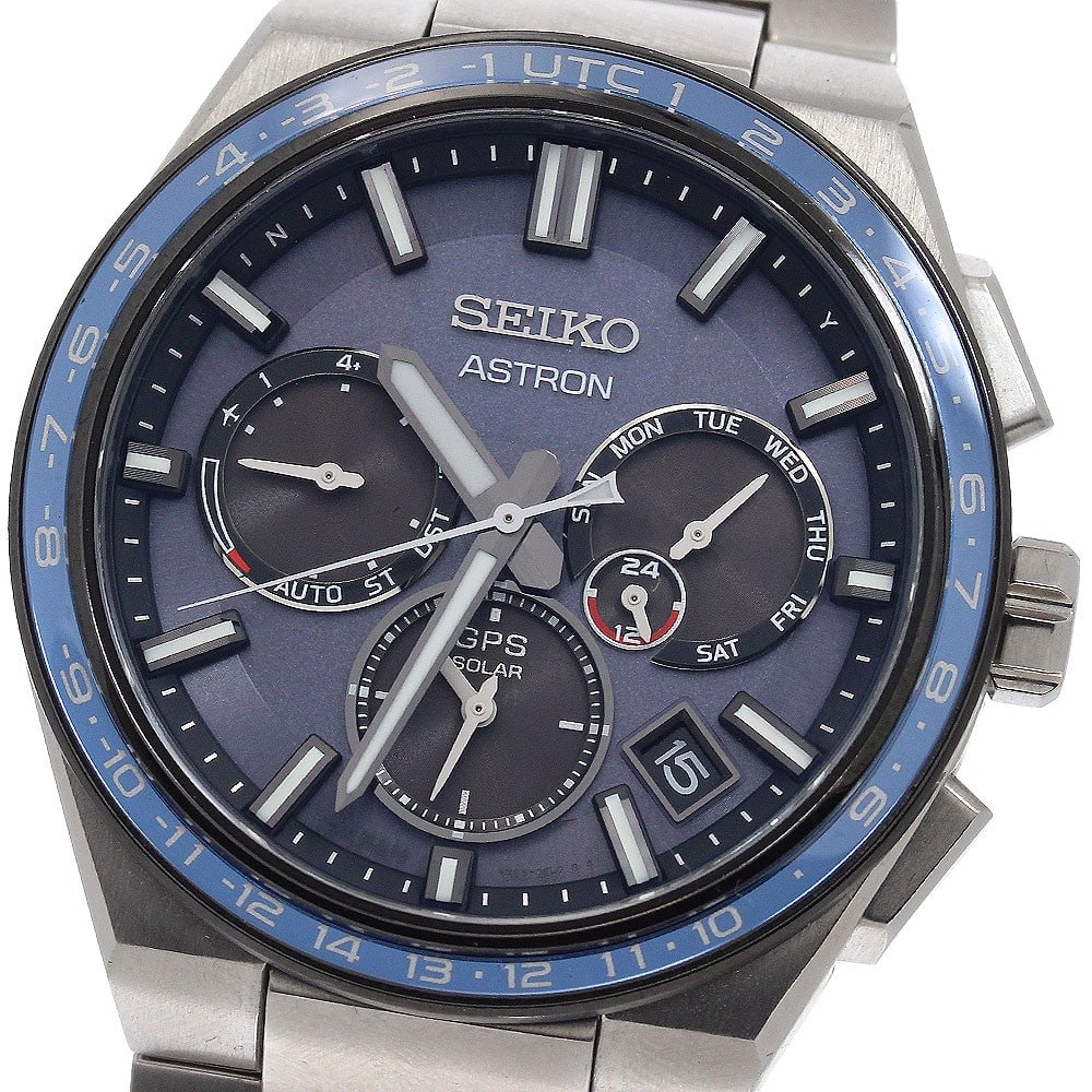 SEIKO Astron Titanium GPS Solar Day-Date Wristwatch SBXC109: SEIKO Astron Titanium GPS Solar Day-Date Wristwatch SBXC109 This Seiko Astron SBXC109/5X53-0BR0 is a men's wristwatch featuring a titanium case and bracelet with a navy dial. The watch operates with a