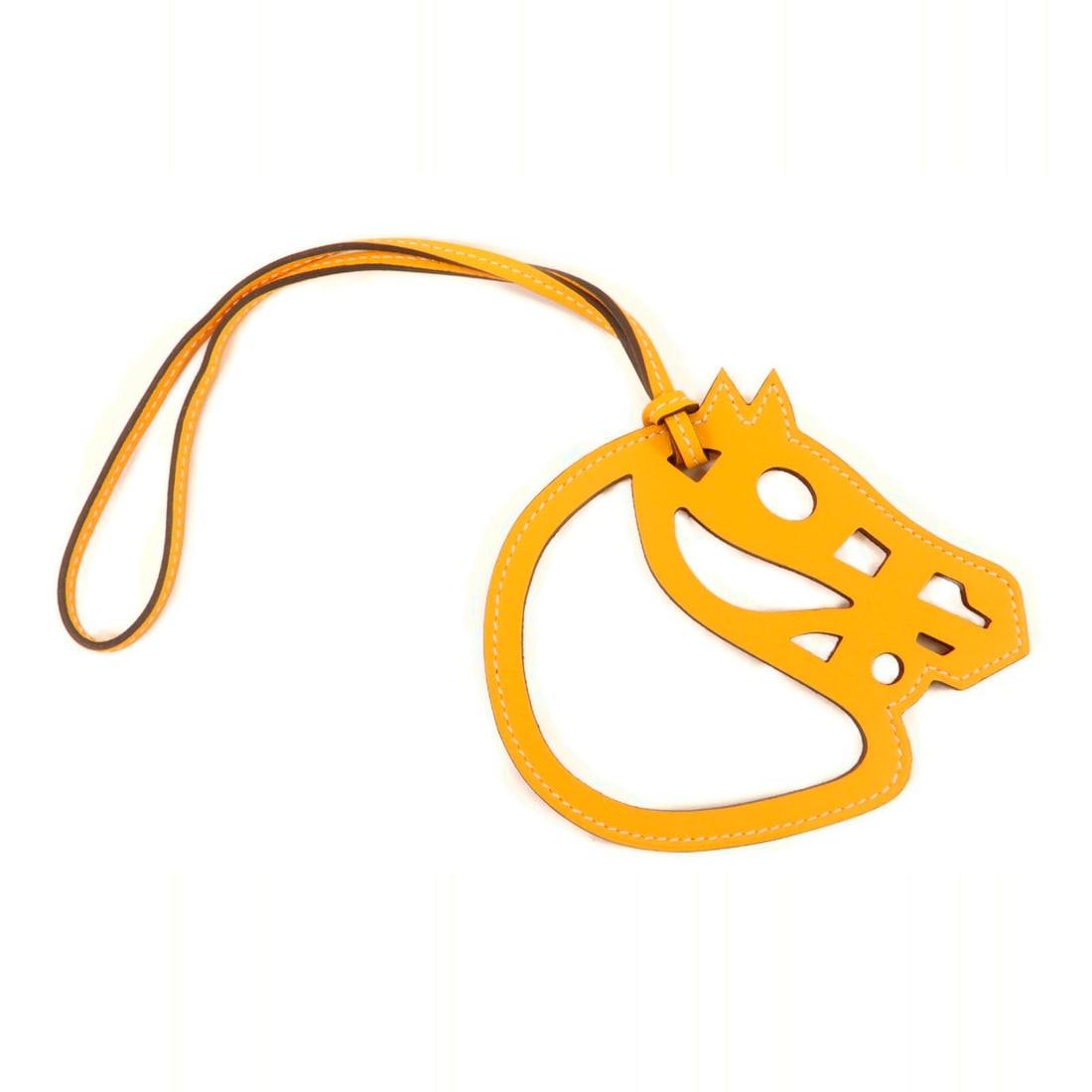 Hermes Paddock Cheval Swift Leather Charm Jaune Ambre: Hermes Paddock Cheval Swift Leather Charm Jaune Ambre This HERMES Paddock Cheval Charm is crafted from Swift calfskin leather in a vibrant yellow shade, designed as a stylish accessory for women. Made