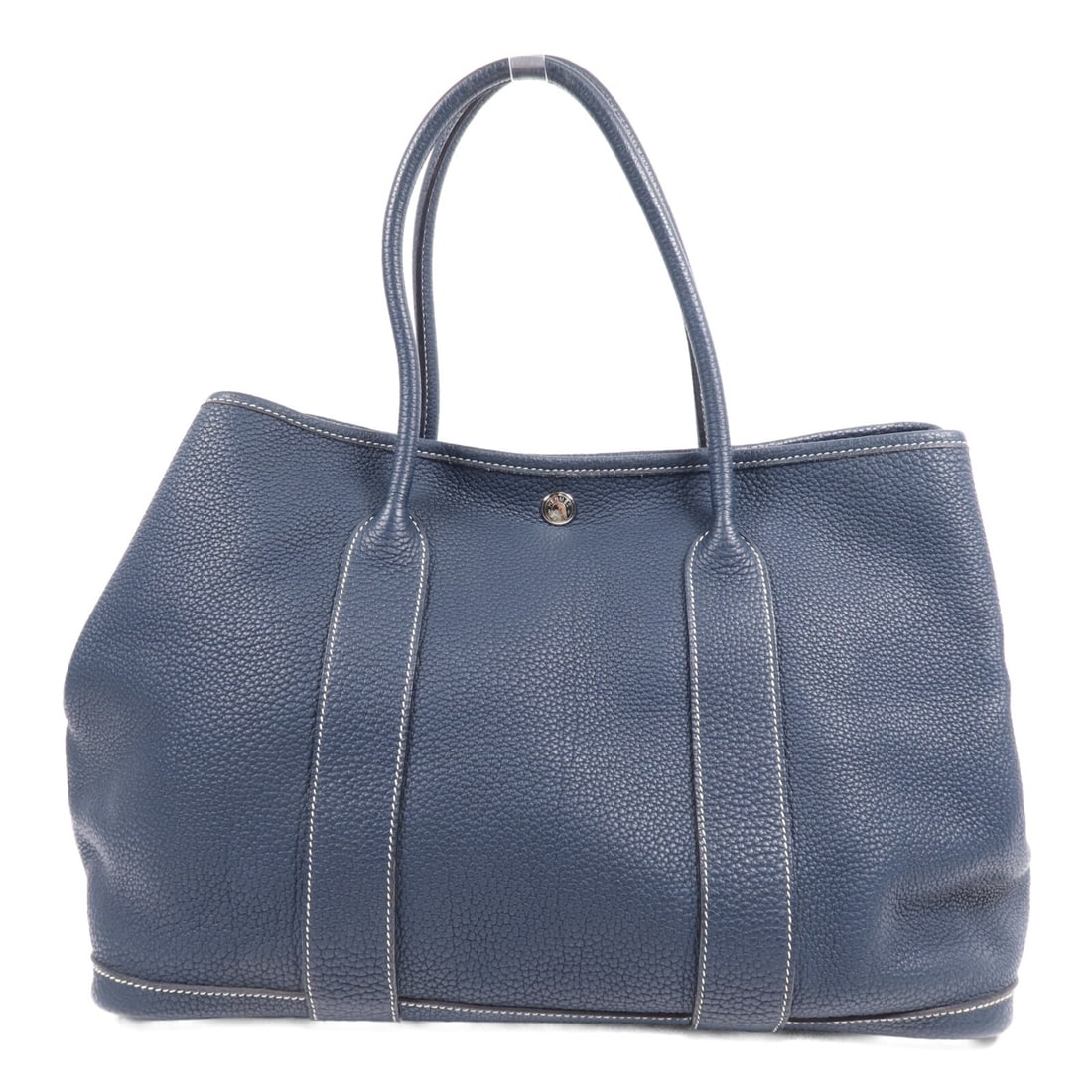 HERMES Garden Party PM navy calfskin handbag Bleu de Prusse: HERMES Garden Party PM navy calfskin handbag Bleu de Prusse This Hermes Garden Party PM handbag features a sophisticated Bleu de Prusse (navy) color and is crafted from high-quality calfskin leather. 
