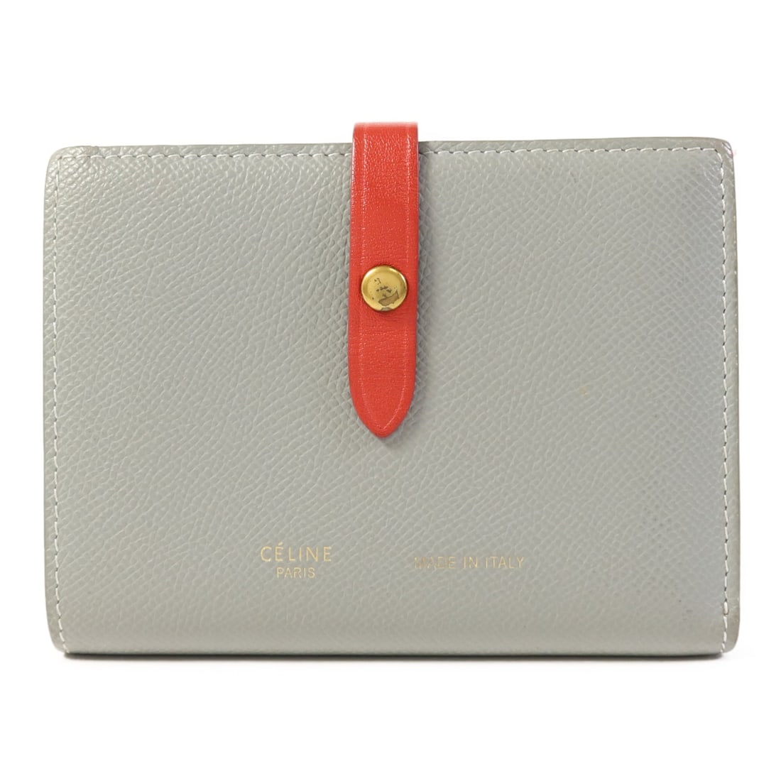 CELINE gray calfskin bi fold wallet GHW: CELINE gray calfskin bi fold wallet GHW This elegant bi-fold wallet from CELINE is crafted from high-quality calfskin leather in a sophisticated gray hue. Designed for everyday use, it features a comp