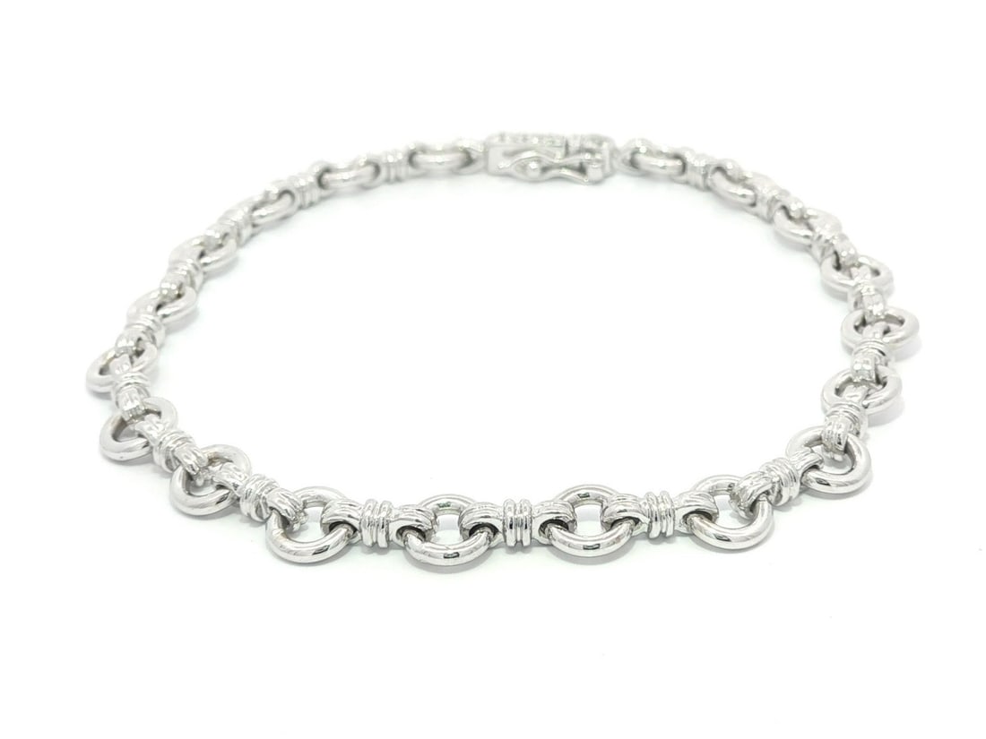 18k White Gold Open Link Charm Bracelet with Diamond Accent: 18k White Gold Open Link Charm Bracelet with Diamond Accent This exquisite Solid White Gold Open Round Link Charm Bracelet features a stunning push clasp adorned with natural diamonds. The bracelet is