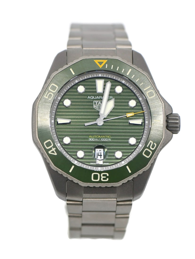 TAG Heuer Aquaracer 43mm Titanium Automatic Green Dial Wristwatch: TAG Heuer Aquaracer 43mm Titanium Automatic Green Dial Wristwatch This TAG Heuer Aquaracer Titanium Watch, reference WPB208B, features a 43 mm titanium case and a matching titanium bracelet. The watch