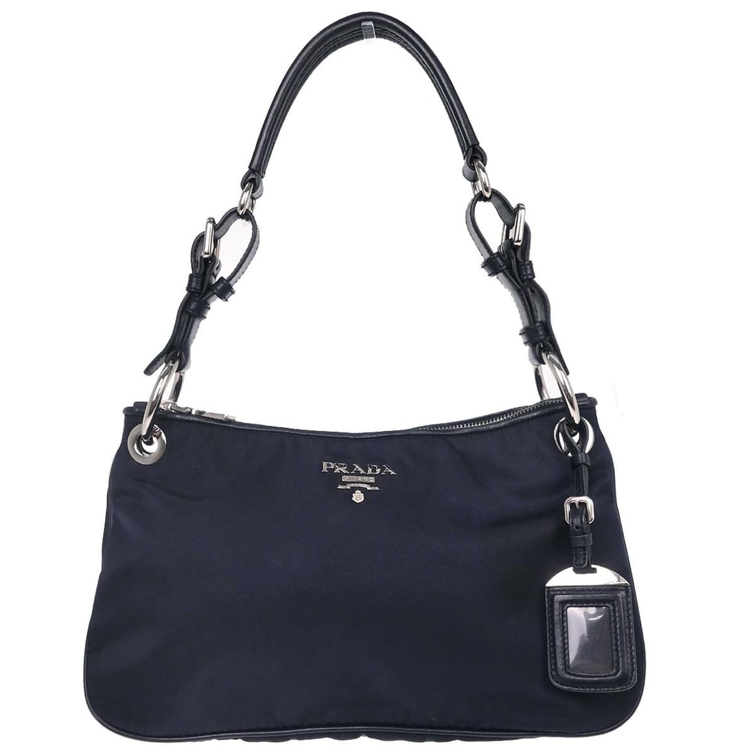 Prada Navy Nylon Top Handle Bag Medium Logo Italy: Prada Navy Nylon Top Handle Bag Medium Logo Italy This Prada navy nylon handbag features a medium-sized design with a top handle style, ideal for casual occasions. The bag is crafted from durable nylo
