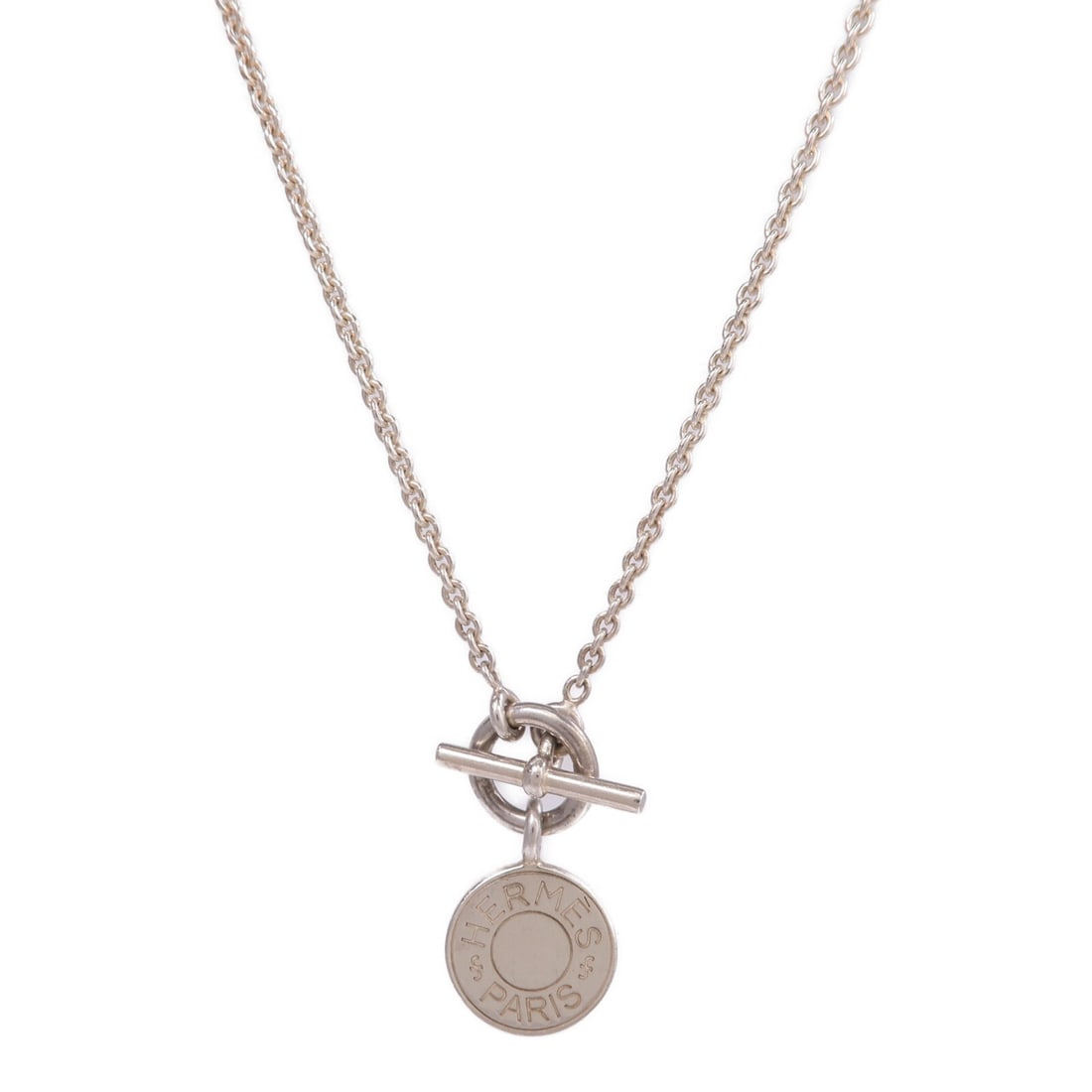 Amulettes Ex-Libris Pendant Necklace in 925 Silver by Hermes: Amulettes Ex-Libris Pendant Necklace in 925 Silver by Hermes This Hermes Amulettes Ex-Libris pendant necklace is crafted from 925 sterling silver and features a minimalist design. Suitable for unisex 