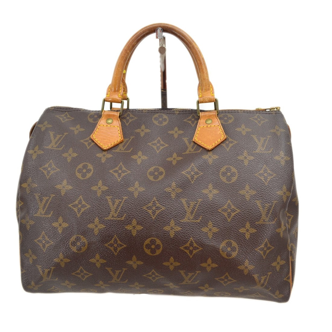 Louis Vuitton Speedy 30 Monogram Canvas Satchel Handbag: Louis Vuitton Speedy 30 Monogram Canvas Satchel Handbag This Louis Vuitton Speedy 30 handbag features the iconic Monogram canvas with beige leather double handles and a zip closure. The bag is designe