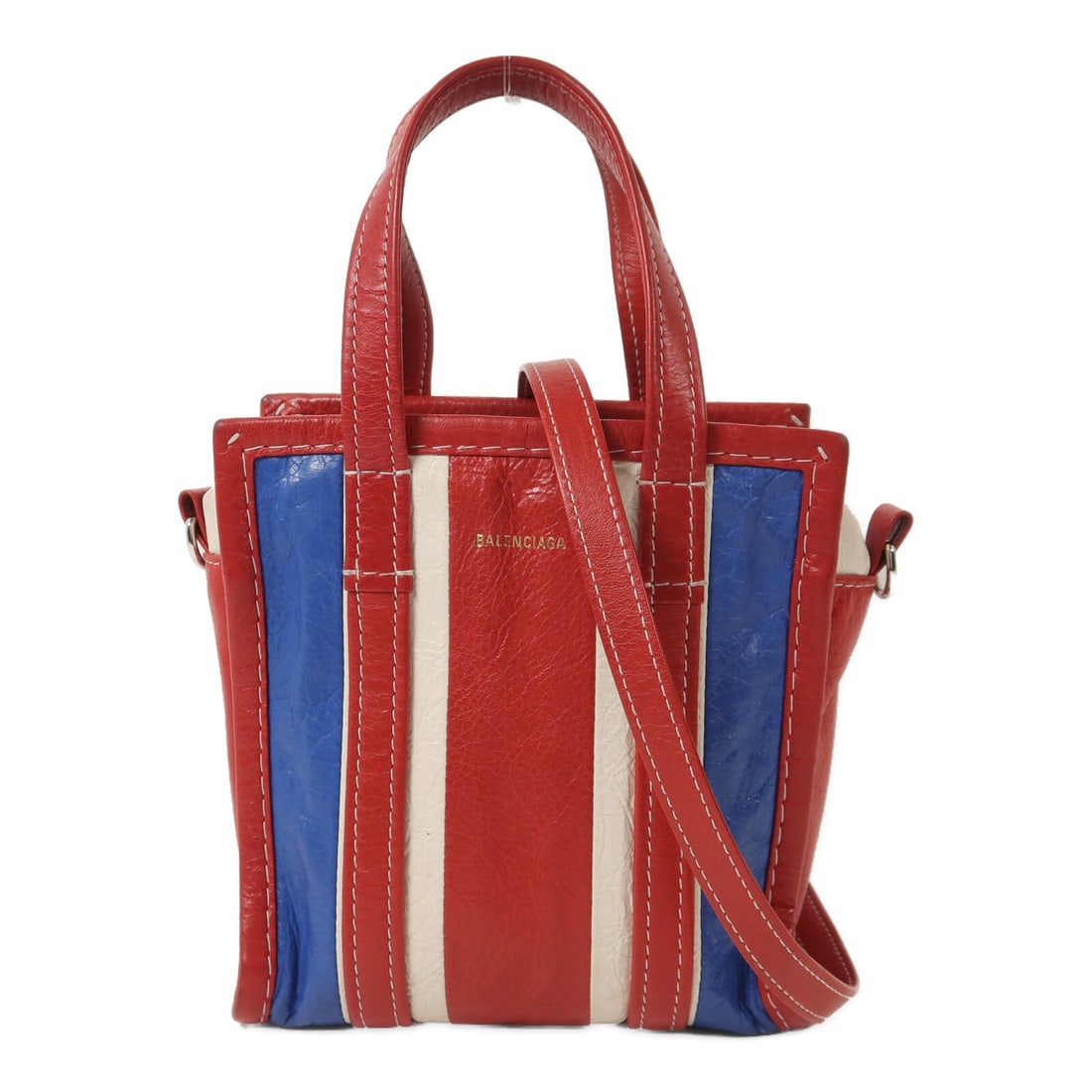 Balenciaga Bazar Lambskin 2 Way Shoulder Bag Red Blue White: Balenciaga Bazar Lambskin 2 Way Shoulder Bag Red Blue White This Balenciaga SHW Bazar Bag is a versatile 2-way shoulder bag crafted from high-quality lambskin leather. Featuring a striking combination