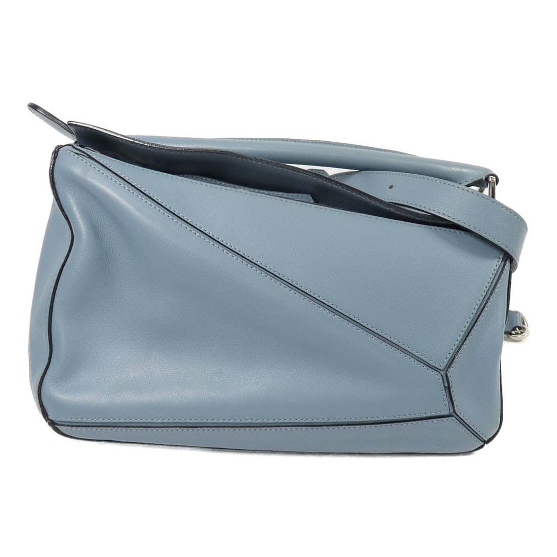 LOEWE Puzzle Medium Blue Calfskin 2way Shoulder Bag: LOEWE Puzzle Medium Blue Calfskin 2way Shoulder Bag This LOEWE Puzzle Medium 2Way Shoulder Bag is crafted from high-quality blue calfskin leather and features a versatile design that can be worn as bo