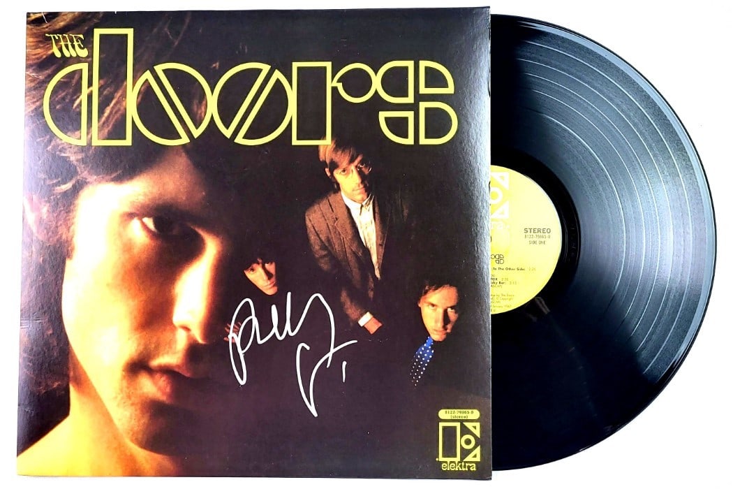 Record Album Signed by Robby Krieger of The Doors Beckett Authenticated: Record Album Signed by Robby Krieger of The Doors Beckett Authenticated This is an original record album autographed by Robby Krieger, guitarist for The Doors. The album has been authenticated by Beck