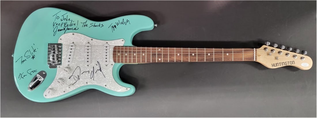 Dennis Quaid Autographed Acoustic Guitar JSA Certified The Sharks: Dennis Quaid Autographed Acoustic Guitar JSA Certified The Sharks This is an original, pre-owned acoustic guitar autographed by Dennis Quaid and his band, The Sharks. The autograph has been authentica