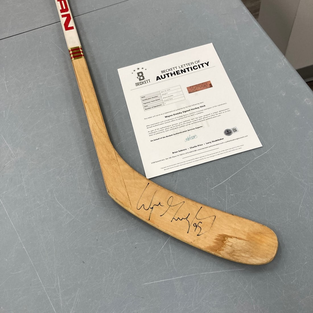 1984 Titan TPM 2020 Wayne Gretzky signed hockey stick Beckett COA: 1984 Titan TPM 2020 Wayne Gretzky signed hockey stick Beckett COA This is an original 1984 Titan TPM 2020 hockey stick made to Wayne Gretzky's specifications and factory-stamped with "W Gretzky." The 