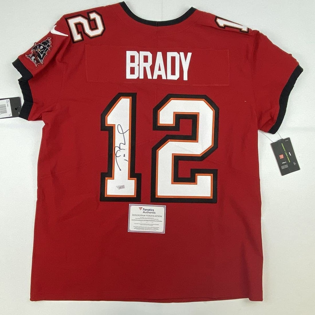 Tom Brady Signed Tampa Bay Buccaneers Nike Elite Jersey With Fanatics COA: Tom Brady Signed Tampa Bay Buccaneers Nike Elite Jersey With Fanatics COA This is a pre-owned Nike Elite Tampa Bay Buccaneers jersey autographed by Tom Brady. The autograph is authenticated by Fanatic