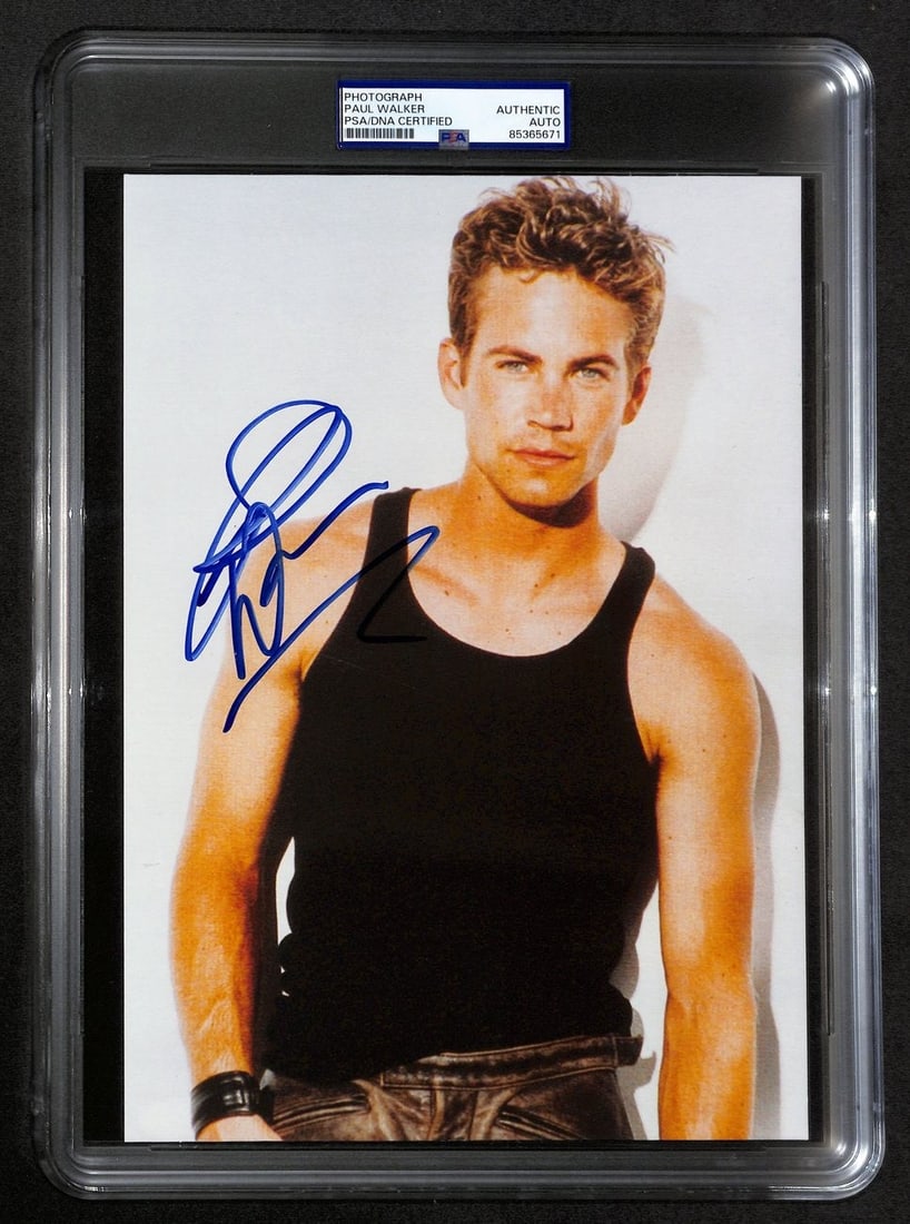 Paul Walker autographed 8x10 photograph Fast & Furious PSA DNA: Paul Walker autographed 8x10 photograph Fast & Furious PSA DNA This is an original 8x10 photograph signed by Paul Walker, the actor known for his role in "Fast & Furious." The photo is authenticated b