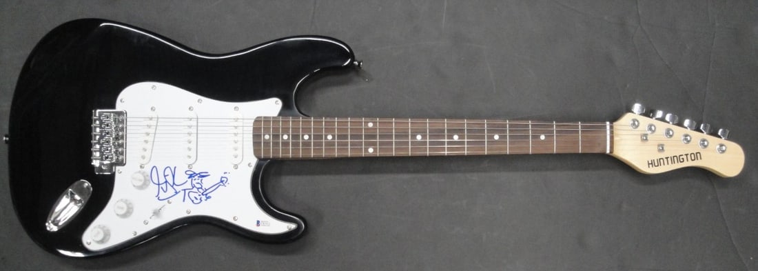 Gilby Clarke Autographed Electric Guitar with Beckett Authentication: Gilby Clarke Autographed Electric Guitar with Beckett Authentication Own a remarkable piece of rock history with this Gilby Clarke autographed electric guitar, featuring a unique sketch. This original