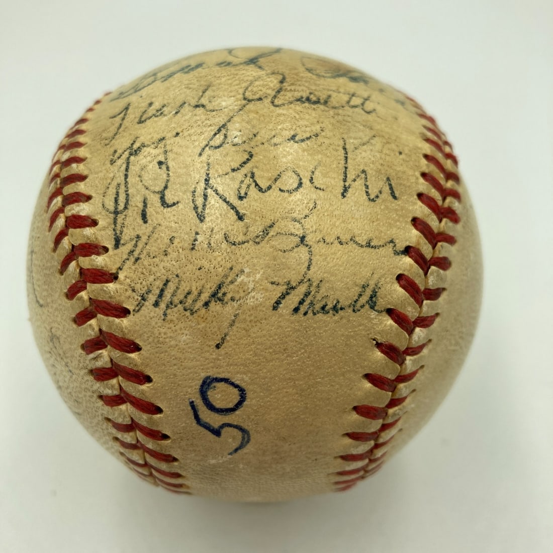 1951 Yankees Team Signed Baseball with Mickey Mantle PSA Authentication: 1951 Yankees Team Signed Baseball with Mickey Mantle PSA Authentication Celebrate the legacy of the New York Yankees with this remarkable team-signed baseball from the 1951 World Series Champions. Thi