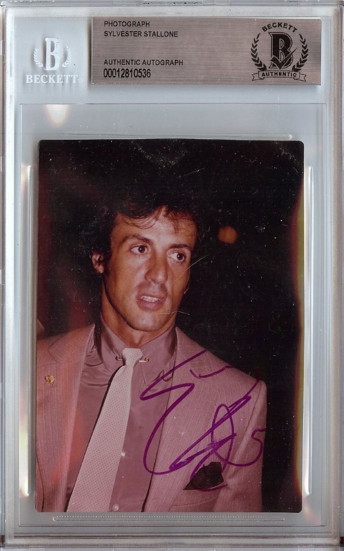 Sylvester Stallone Autographed Vintage 3.5X5 Photo Beckett Authenticated: Sylvester Stallone Autographed Vintage 3.5X5 Photo Beckett Authenticated This is an original 3.5x5 photograph of Sylvester Stallone, famously known for his role as Rocky. The photo has been personally