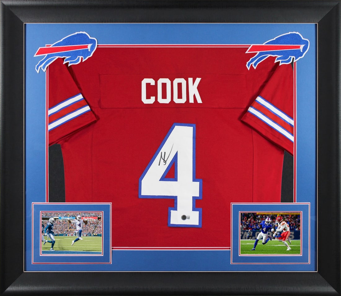 Framed Buffalo Bills jersey signed by James Cook Beckett authenticated: Framed Buffalo Bills jersey signed by James Cook Beckett authenticated This professionally framed red pro style jersey has been personally autographed by James Cook of the Buffalo Bills. The jersey is