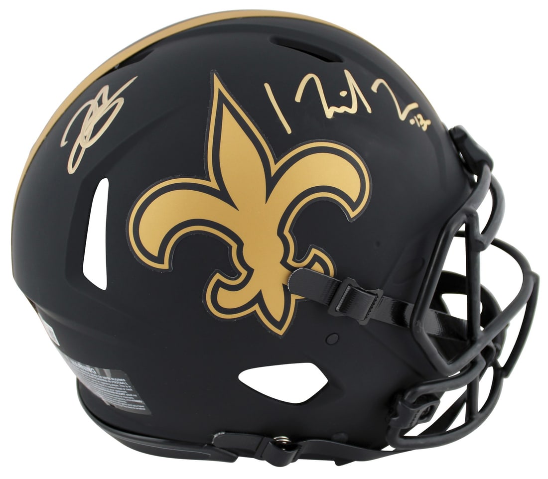 Derek Carr Michael Thomas Signed Eclipse F/S Helmet Beckett Authenticated: Derek Carr Michael Thomas Signed Eclipse F/S Helmet Beckett Authenticated This authentic full-size Speed Proline helmet features the signatures of NFL stars Derek Carr and Michael Thomas, both of whom