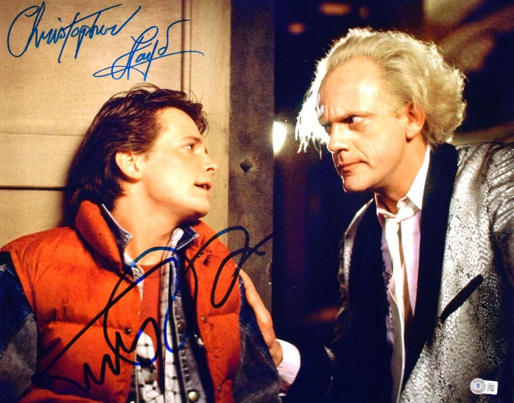 Back to the Future 16x20 Photo Signed by Christopher Lloyd and Michael J Fox Beckett: Back to the Future 16x20 Photo Signed by Christopher Lloyd and Michael J Fox Beckett This 16x20 photograph from the movie "Back to the Future" features authentic signatures from Christopher Lloyd and 