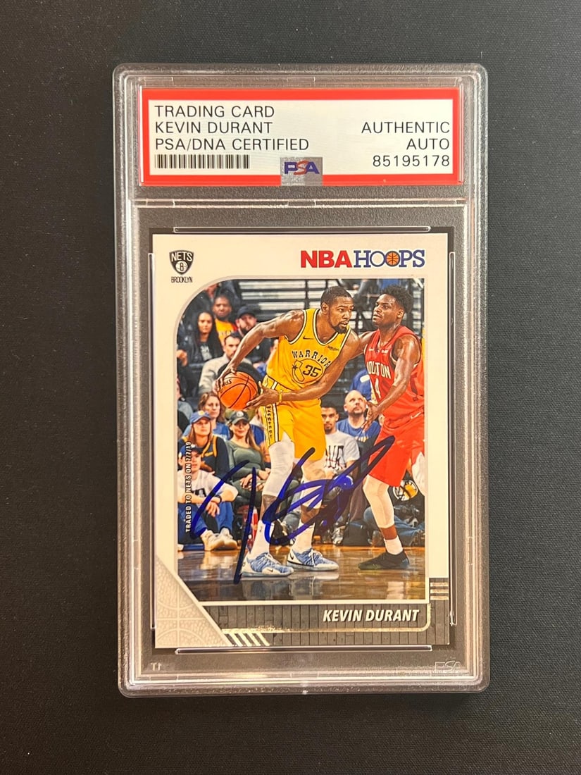 2019-20 Panini Hoops #61 Kevin Durant Autographed Card PSA Certified: 2019-20 Panini Hoops #61 Kevin Durant Autographed Card PSA Certified This 2019-20 Panini Hoops #61 sports trading card features a bold autograph from NBA star Kevin Durant. Encapsulated by Professiona