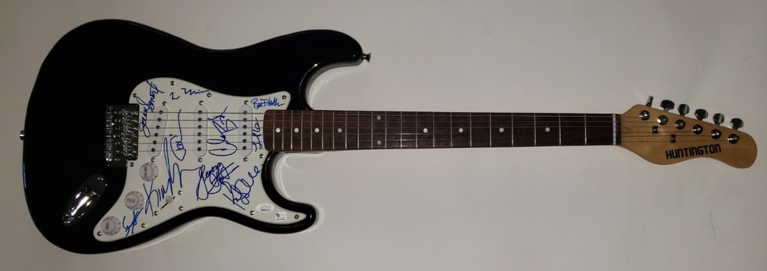 JSA authenticated 24 cast signed electric guitar: JSA authenticated 24 cast signed electric guitar This original electric guitar and guitar pick set features autographs from 24 cast members, including Kiefer Sutherland, Bernard, Smart, Astin, and oth