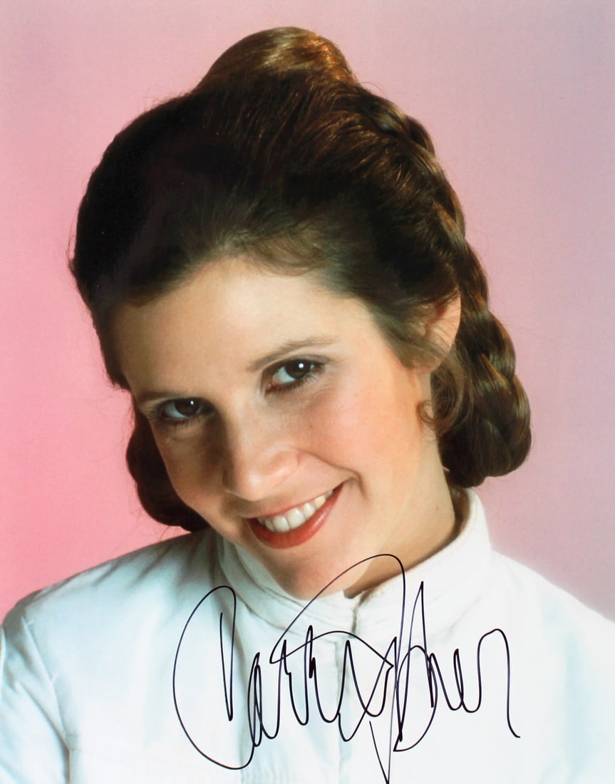 Carrie Fisher Signed 11x14 Star Wars Photo BAS A55998: Carrie Fisher Signed 11x14 Star Wars Photo BAS A55998 This stunning 11x14 photograph features the iconic Carrie Fisher, beautifully autographed. A must-have for any Star Wars fan, this original piece 