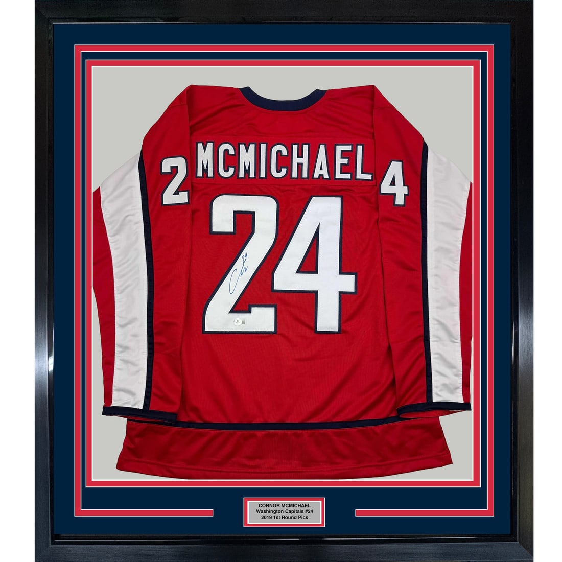 Framed Connor McMichael Autographed Jersey Washington Capitals BAS COA 35x39: Framed Connor McMichael Autographed Jersey Washington Capitals BAS COA 35x39 Celebrate your passion for hockey with this professionally framed autographed Connor McMichael Washington Capitals jersey. 