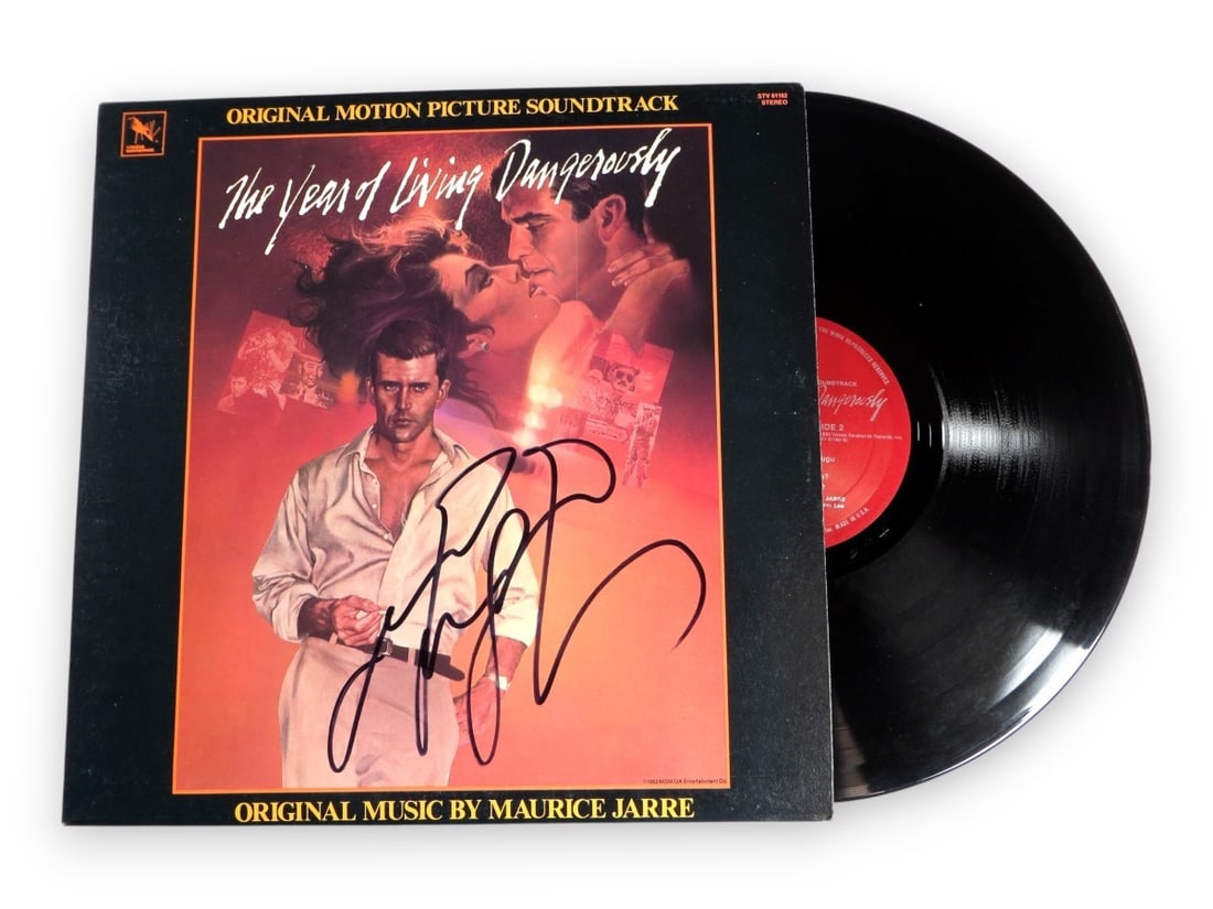 Mel Gibson Signed Album The Year of Living Dangerously JSA Authenticated: Mel Gibson Signed Album The Year of Living Dangerously JSA Authenticated This Mel Gibson autographed record album features the iconic film "The Year of Living Dangerously." The signature has been auth