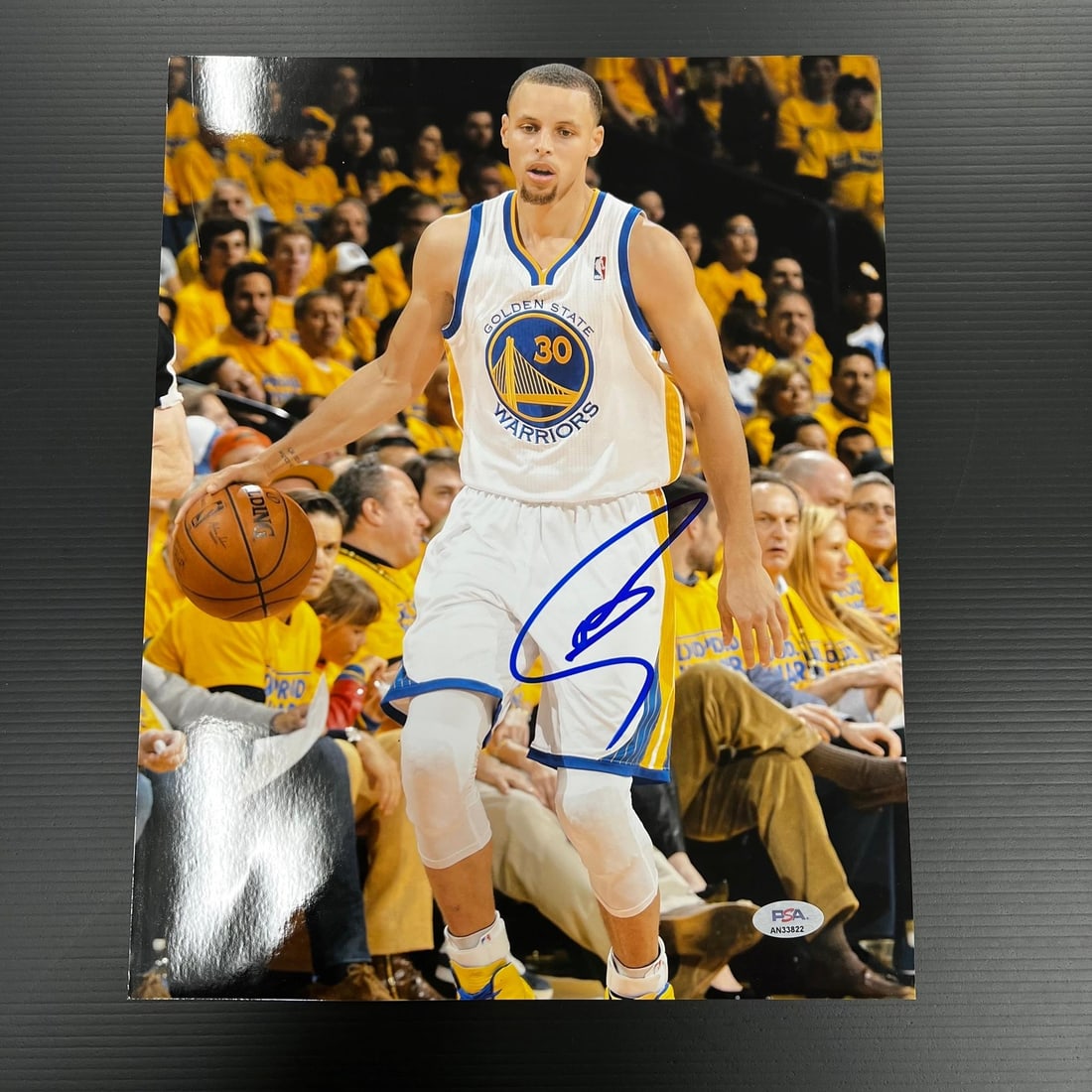 Stephen Curry Autographed 11x14 Photo PSA/DNA Golden State Warriors: Stephen Curry Autographed 11x14 Photo PSA/DNA Golden State Warriors This is an original 11x14 photograph featuring Stephen Curry of the Golden State Warriors, professionally printed and autographed by