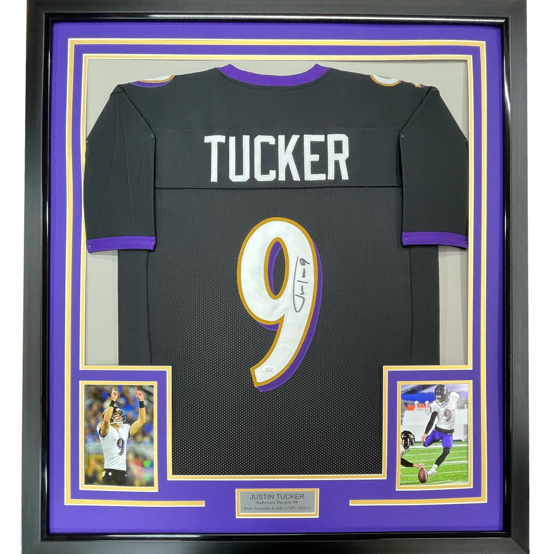 Framed Justin Tucker Signed Jersey Baltimore Ravens JSA COA 35x39: Framed Justin Tucker Signed Jersey Baltimore Ravens JSA COA 35x39 This professionally framed and matted item features a black jersey signed by NFL star Justin Tucker of the Baltimore Ravens. The displ