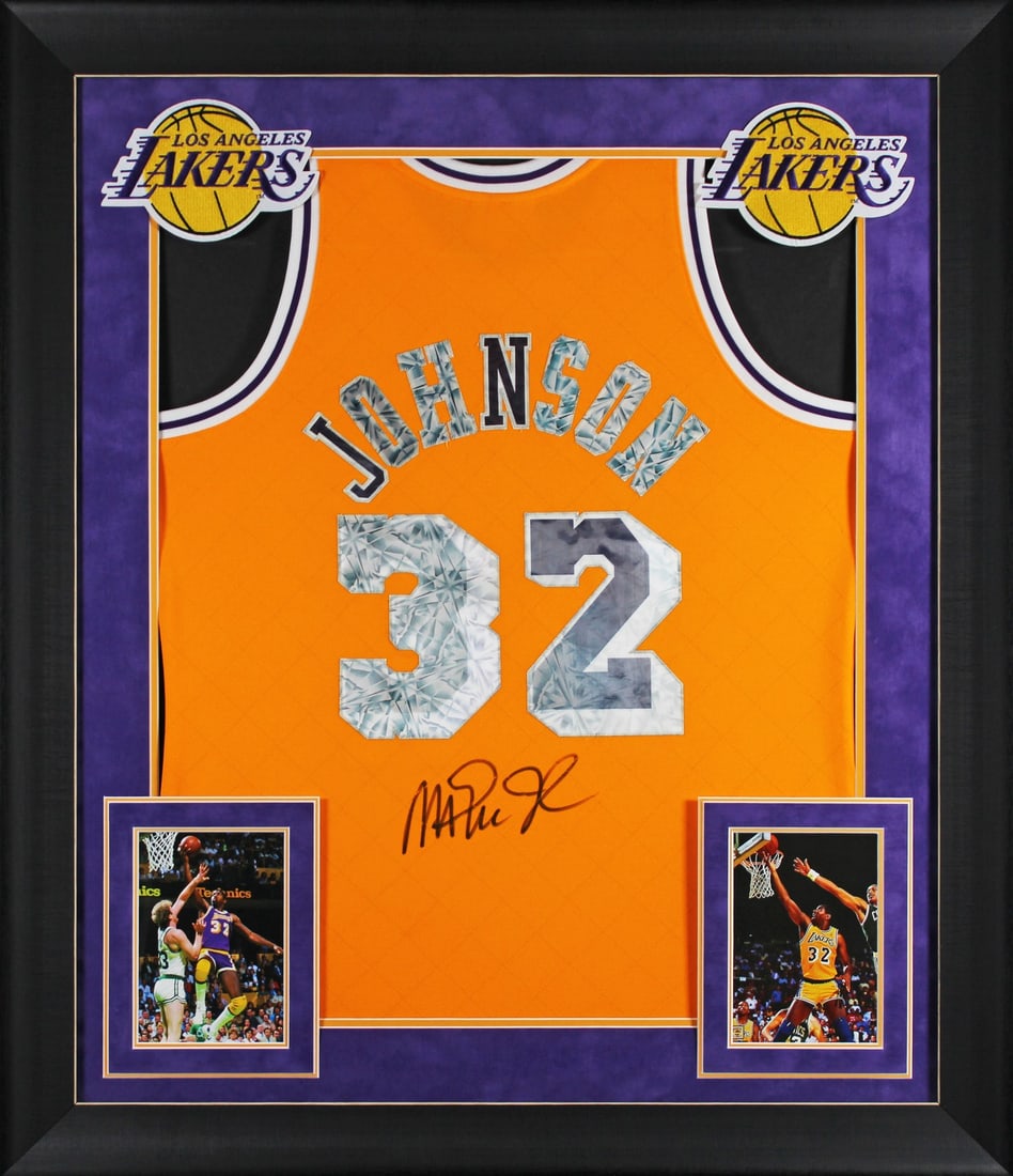 Framed Magic Johnson signed Lakers Mitchell Ness 1984 85 swingman jersey BAS: Framed Magic Johnson signed Lakers Mitchell Ness 1984 85 swingman jersey BAS This framed Mitchell & Ness 1984-85 Hardwood Classics Swingman jersey features a yellow diamond stitched design and has bee
