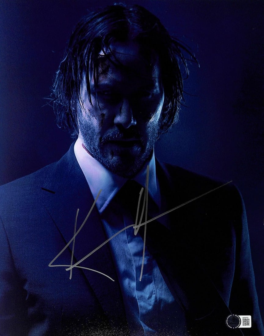 11x14 Beckett authenticated Keanu Reeves John Wick signed photo: 11x14 Beckett authenticated Keanu Reeves John Wick signed photo This is an 11x14 inch photograph signed by Keanu Reeves in character as John Wick from the popular action franchise. The glossy photo fe