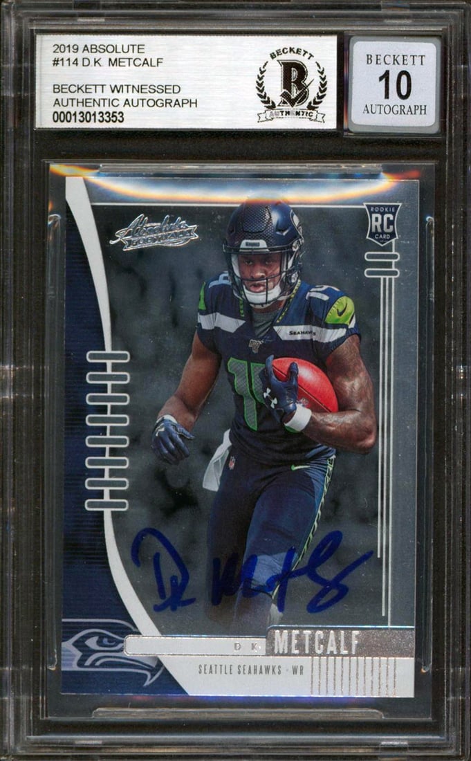 DK Metcalf Signed 2019 Absolute Rookie Card Auto 10 Beckett Slabbed: DK Metcalf Signed 2019 Absolute Rookie Card Auto 10 Beckett Slabbed This DK Metcalf autographed 2019 Absolute #114 rookie card is a must-have for any Seattle Seahawks fan. Graded Gem Mint 10 by Becket