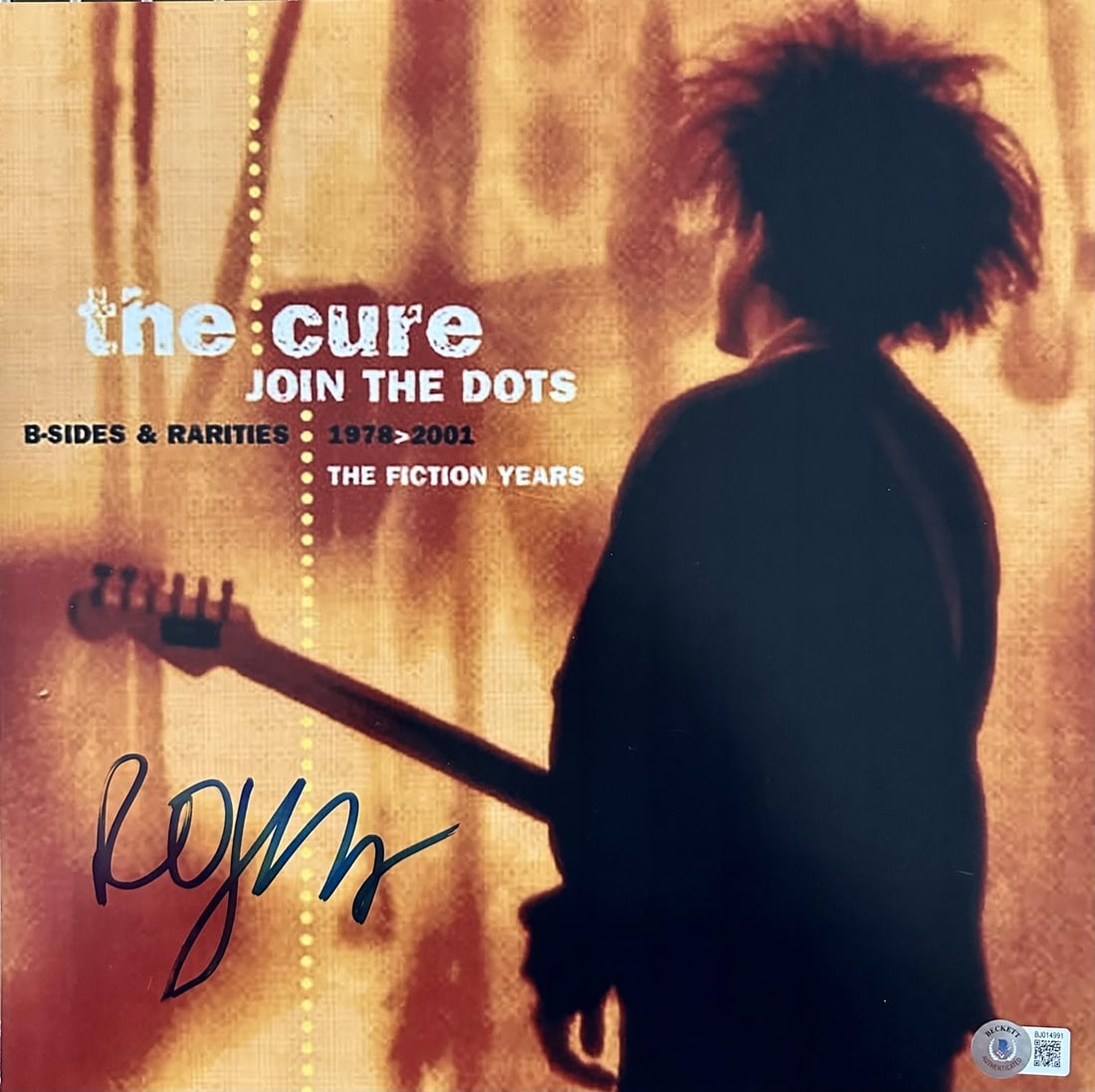BAS Authenticated Robert Smith Signed The Cure Join the Dots Album Cover 12x12 Photo: BAS Authenticated Robert Smith Signed The Cure Join the Dots Album Cover 12x12 Photo This collectible features a 12x12 inch album cover photo of The Cure's "Join the Dots: B-Sides & Rarities 1978-2001