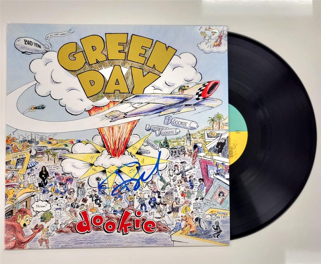 Green Day Dookie album cover autographed by Billie Joe Armstrong Beckett authenticated: Green Day Dookie album cover autographed by Billie Joe Armstrong Beckett authenticated This is an original Green Day 'Dookie' record album cover signed by Billie Joe Armstrong. The autograph has been 