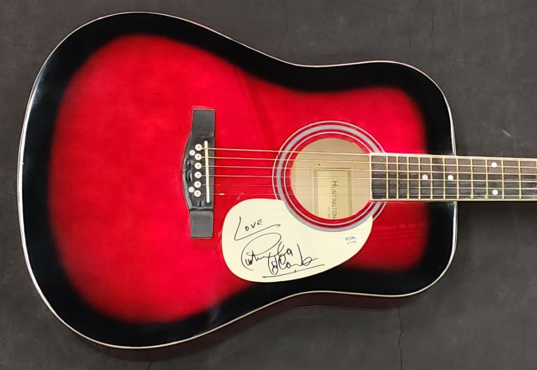 Petula Clark signed acoustic red guitar PSA AL77359: Petula Clark signed acoustic red guitar PSA AL77359 This is a pre-owned acoustic guitar in red, hand signed by pop singer Petula Clark. The autograph has been authenticated by Professional Sports (PSA