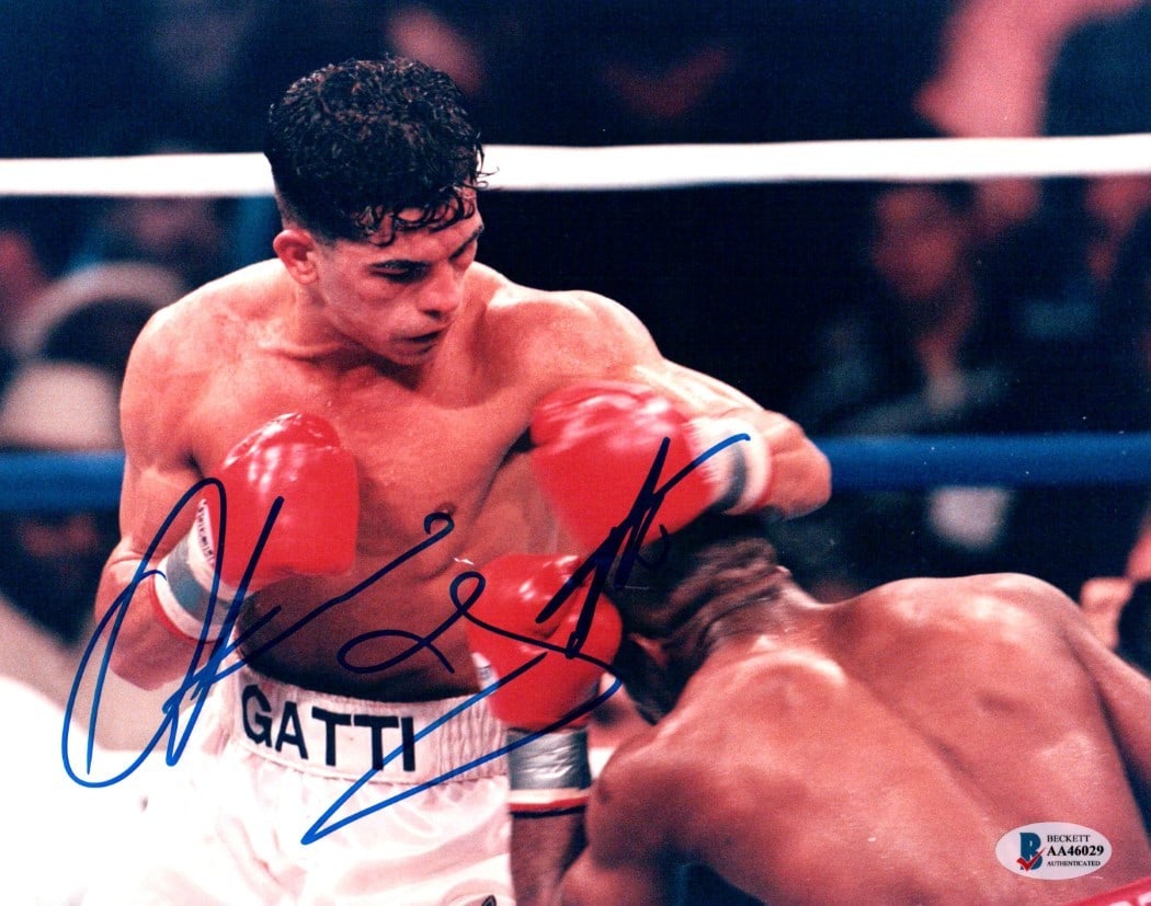Arturi Gatti Autographed 8X10 Boxing Photo Beckett Authenticated: Arturi Gatti Autographed 8X10 Boxing Photo Beckett Authenticated This is an original 8x10 photo of boxer Arturi Gatti captured during a fight action shot. The photograph features Gatti's authentic sig