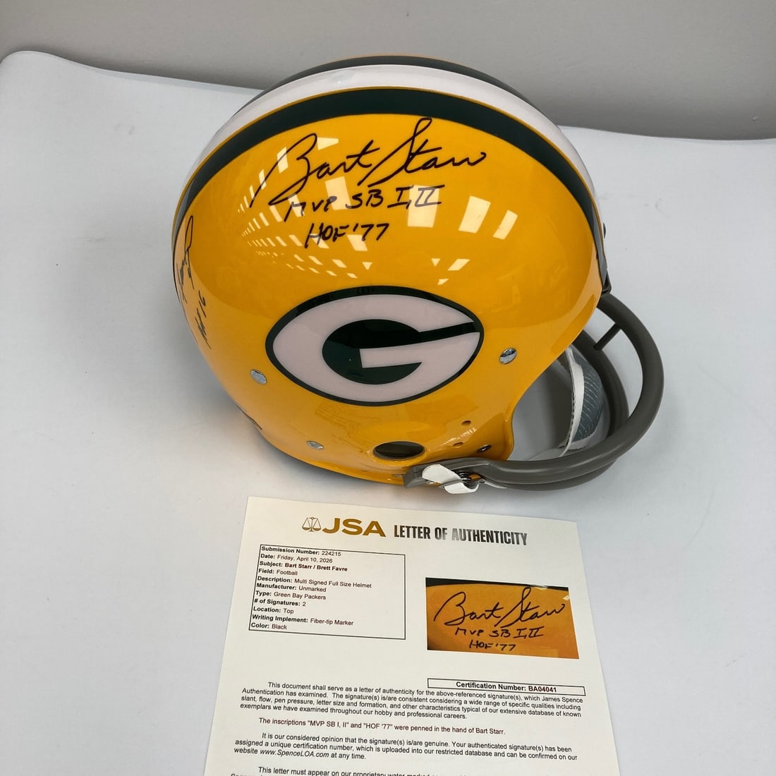 Green Bay Packers full size authentic helmet signed by Starr and Favre JSA: Green Bay Packers full size authentic helmet signed by Starr and Favre JSA This is a full-size authentic Green Bay Packers helmet signed by Bart Starr, inscribed with "MVP Super Bowl HOF 1977," and Br