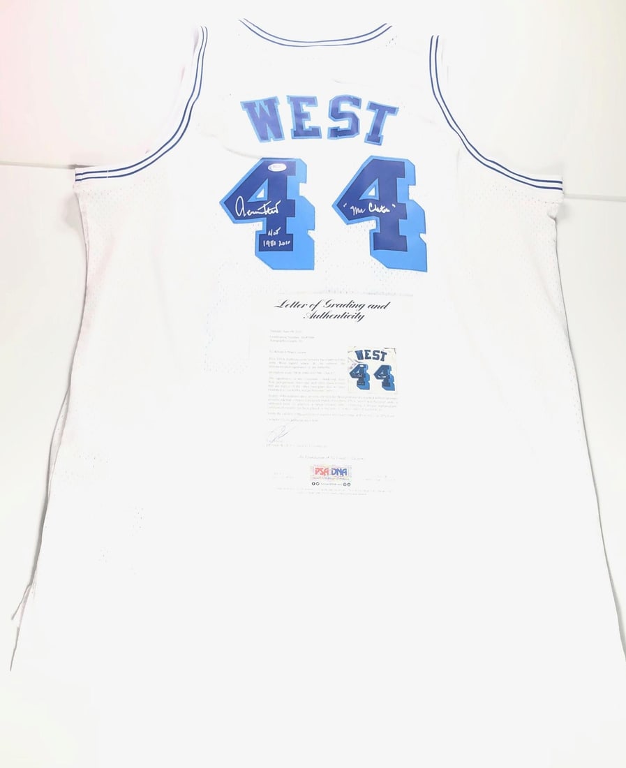 Jerry West Autographed Lakers Jersey With PSA DNA Authentication and Inscriptions: Jerry West Autographed Lakers Jersey With PSA DNA Authentication and Inscriptions This is an original Los Angeles Lakers jersey, stitched and autographed by Jerry West. The jersey features the inscrip